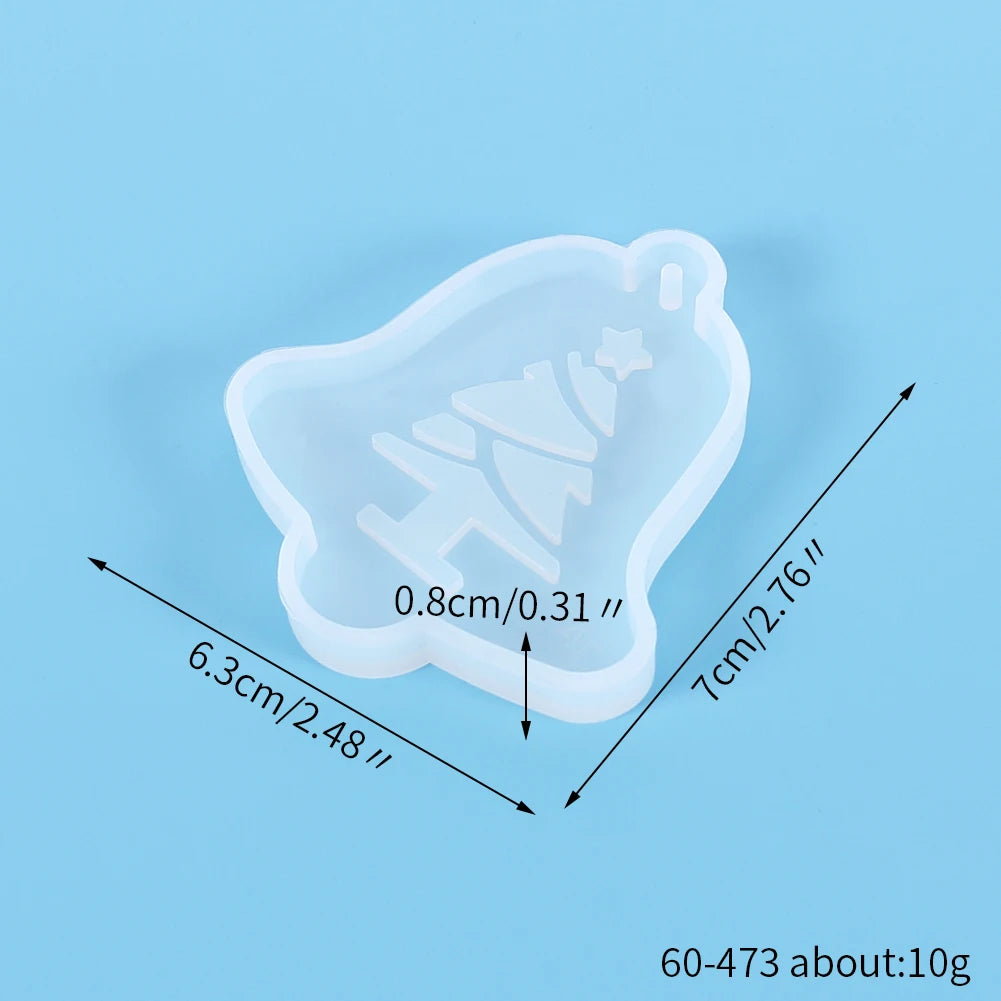 A translucent silicone mold shaped like a festive Christmas tree for jewelry and craft projects.