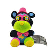 A plush toy of a stylized animal character with pink and black fur and a pink hat.