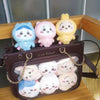 A collection of pastel-colored Usagi Hachiware plush keychains in various cute expressions and themes.