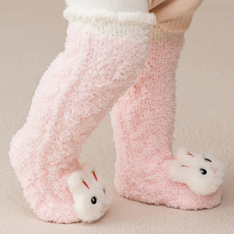 Pink coral velvet baby knee-high socks with white trim and cute animal feet