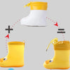A comparison showing a white rain boot and a yellow rain boot, demonstrating the product's features.