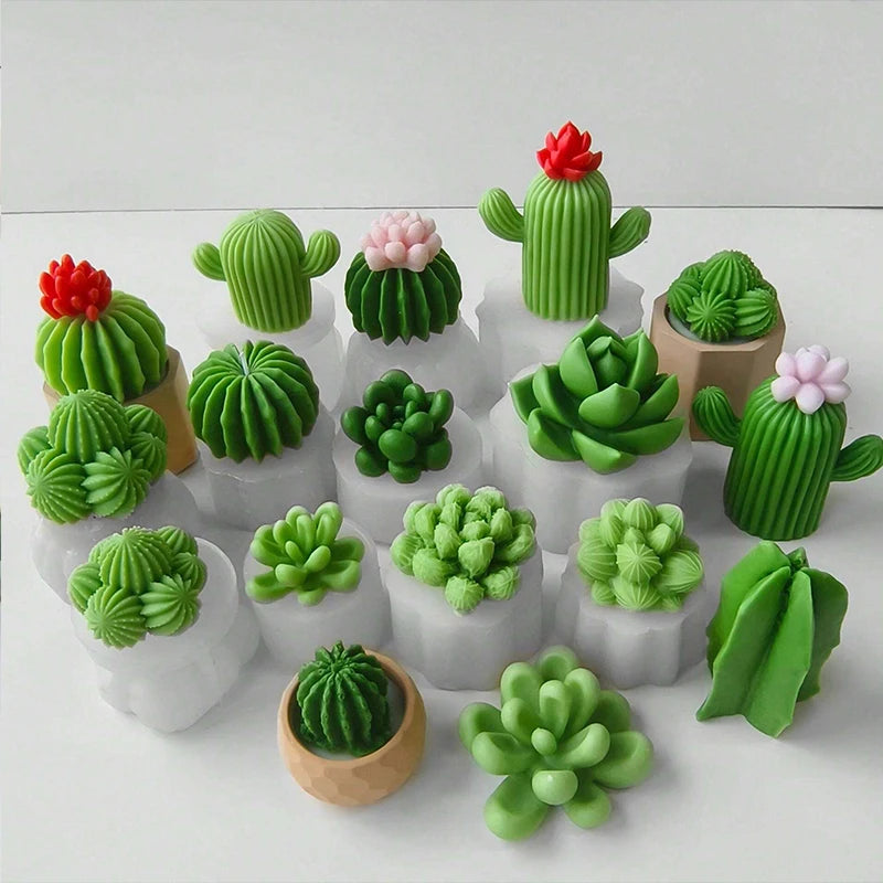 A collection of green and pink silicone molds shaped like various cacti and succulents for crafting.