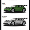 Diecast model cars of the Porsche 911 GT3 RS in green and silver gray colors.