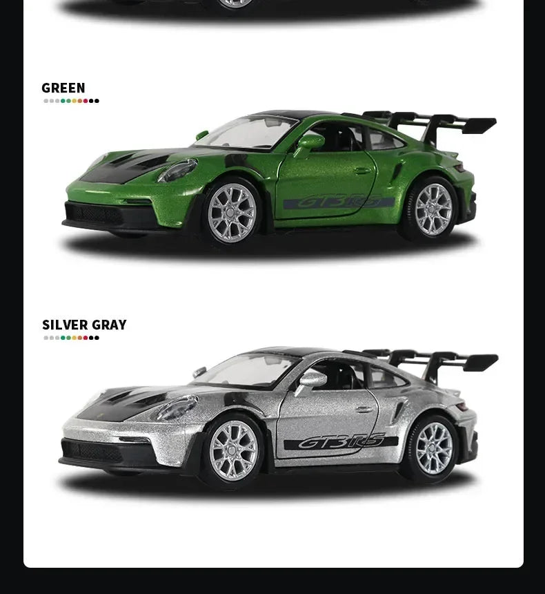 Diecast model cars of the Porsche 911 GT3 RS in green and silver gray colors.