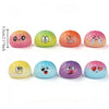 Sammlung farbenfroher Stressabbau-Fidget-Dumpling-Spielzeuge in verschiedenen Schattierungen wie rosa, grün, orange, gelb und