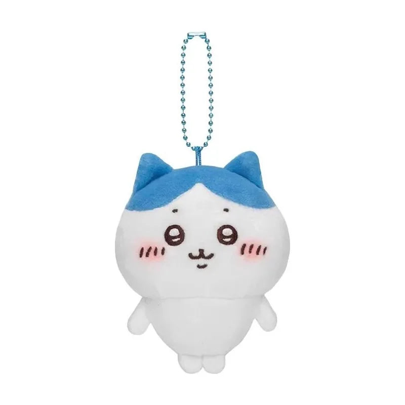 A soft white and blue Chiikawa Usagi plush keychain charm with a dangling silver chain.