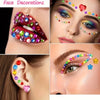 Close-up of a woman's face and lips decorated with colorful acrylic rhinestone stickers for beauty and craft projects