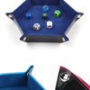 A hexagonal folding PU leather dice tray with various colored dice inside.