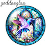 Round glass cabochons for jewelry making featuring a vibrant purple and blue bird design in a stained glass style.