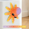 A colorful 3D printed articulated octopus fridge magnet with orange and purple hues.