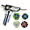 A black and white gyroscope launcher set with various colored spinning components for a STEM toy.