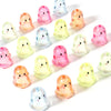 A collection of translucent acrylic ghost beads in various colors including pink, yellow, and blue.