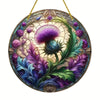 A round acrylic window hanging featuring a detailed floral design with purple and green thistle elements.