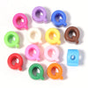 A collection of colorful acrylic letter Q beads in various shades including pink purple blue yellow green and orange