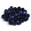 A pile of 50 imitation jade acrylic cloud beads in deep blue and purple shades for jewelry making
