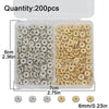 A clear plastic container holds 200 silver and gold snowflake spacer beads for jewelry making.