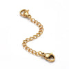 A gold-colored stainless steel jewelry extender chain with a clasp and jump rings.