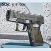 A silver high-power water blaster gun is displayed on a surface.