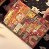 A close-up of a sticker book featuring 50 unique retro Showa style designs and illustrations.