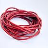 A coil of red flexible silicone tinned copper wire with multiple AWG gauges.