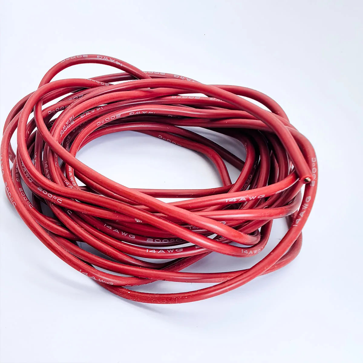 A coil of red flexible silicone tinned copper wire with multiple AWG gauges.