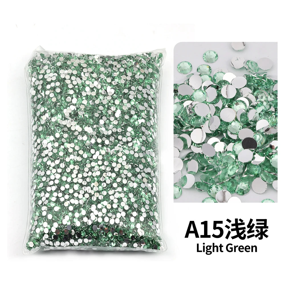 Bag of light green flat-back resin rhinestones for DIY craft and nail art