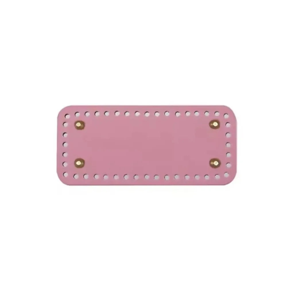 A pink PU leather crochet bag bottom rectangle shape with pre-punched holes.