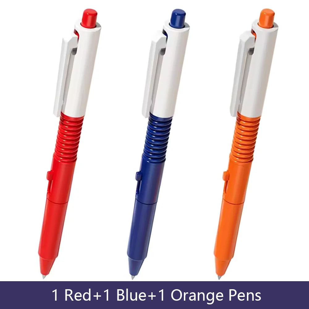 Three squirt water spray ballpoint pens in red blue and orange colors