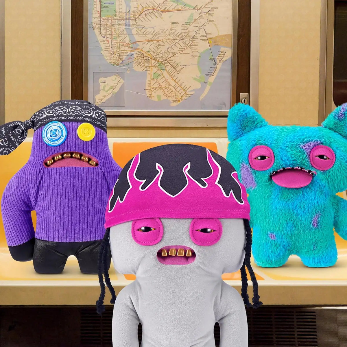 A collection of three plush toys resembling ugly monsters with human-like teeth, featuring purple, blue, and white skin tones
