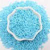 A pile of bright blue polymer clay slice sprinkles for slime and DIY crafts