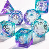 A collection of handmade liquid core polyhedral dice in shades of purple and blue with a galaxy finish