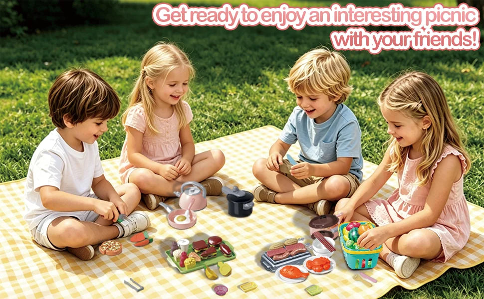 Children playing outdoors on a picnic blanket with pretend play food and cookware.