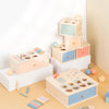 A wooden Montessori color and shape sorting box set with various colored wooden shapes and blocks.