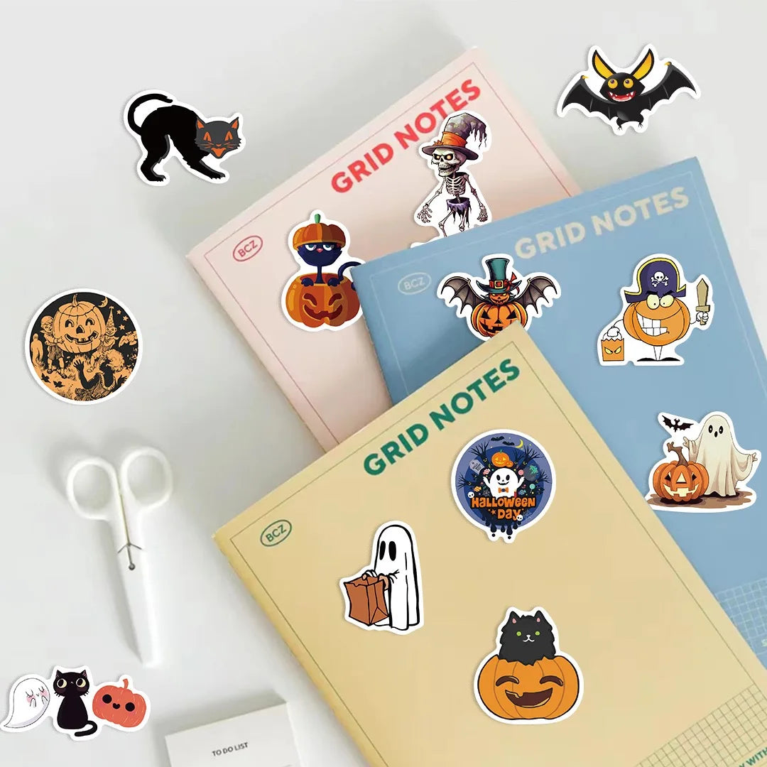 A collection of Halloween themed stickers featuring bats, cats, pumpkins, and ghosts on various colored paper sheets.