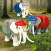 A set of six elephant building blocks in various colors and styles, including gray, white, blue, and red.