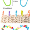 A collection of colorful locking stitch markers for knitting and crochet, including plastic and wire types.