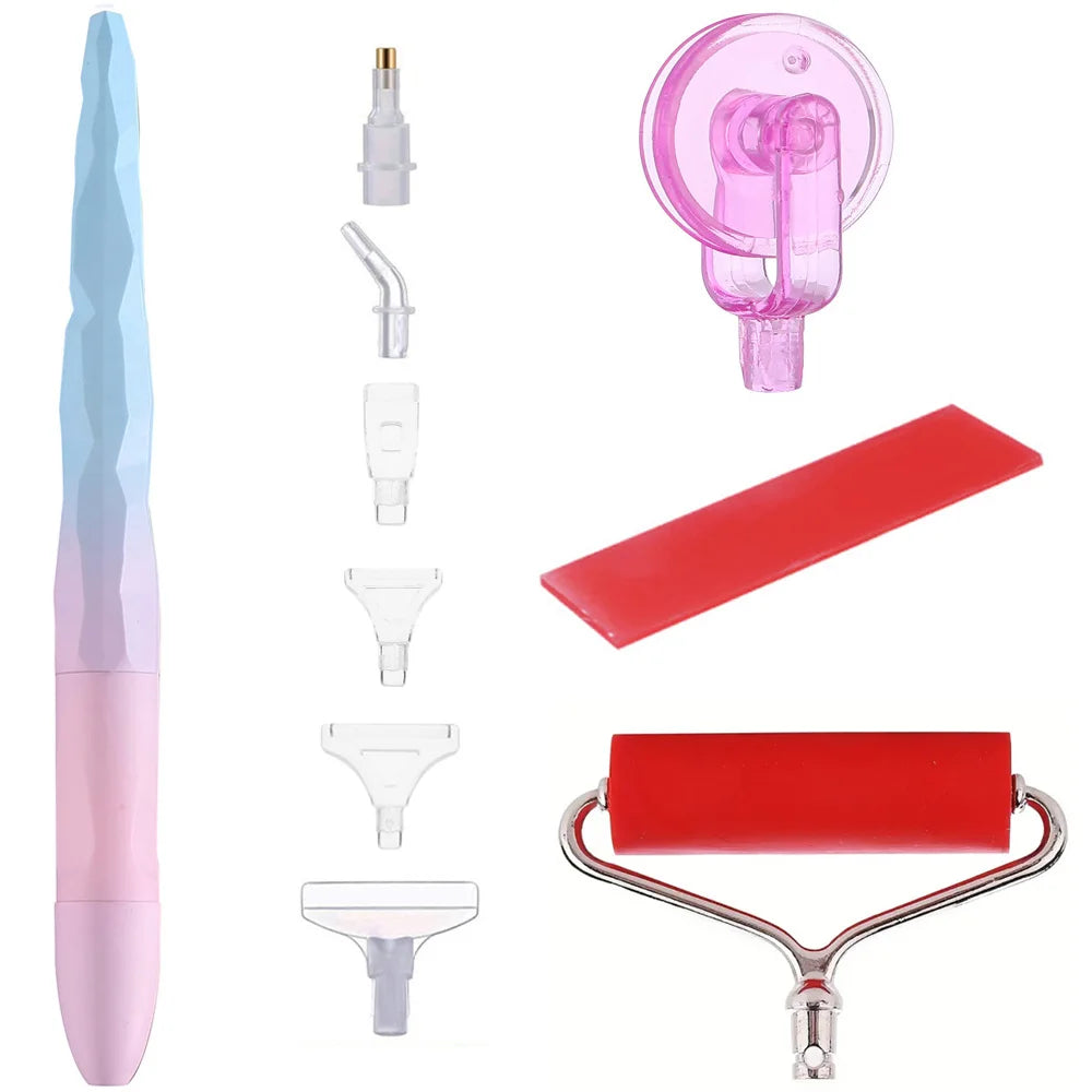 A kit of diamond painting tools including a pen, roller tool, and various shaping tools.