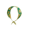 A handmade strawberry crochet headband featuring green and orange yarn with a wide elastic band.