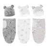 A set of cotton newborn swaddle blanket and hat featuring various bear and geometric patterns.