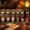 A set of six metal keychains featuring character pendants from Stranger Things.