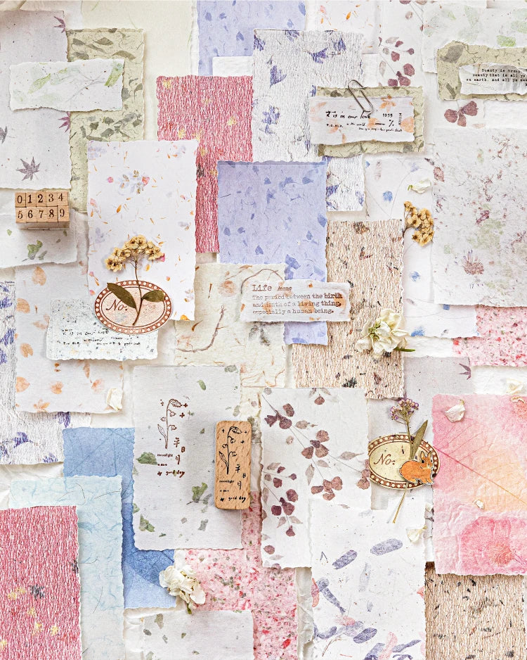 A collage of vintage scrapbook paper featuring various textures, colors, and handwritten elements.