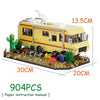 A yellow RV camper bus building block set featuring a cactus and desert landscape, with dimensions 13.5cm long.