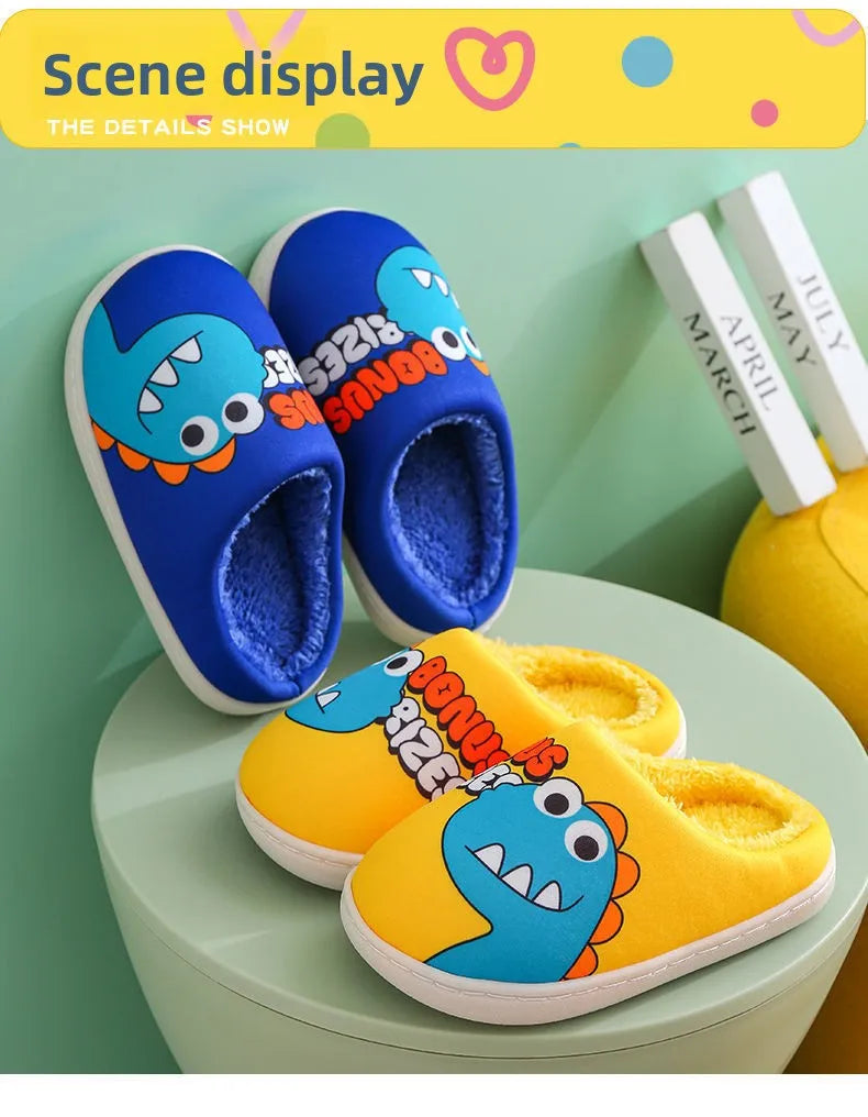 A display of blue and yellow cartoon dinosaur plush slippers on a light green surface.