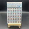 A vertical sheet of light blue decorative stickers featuring cute animals and fruit for crafting