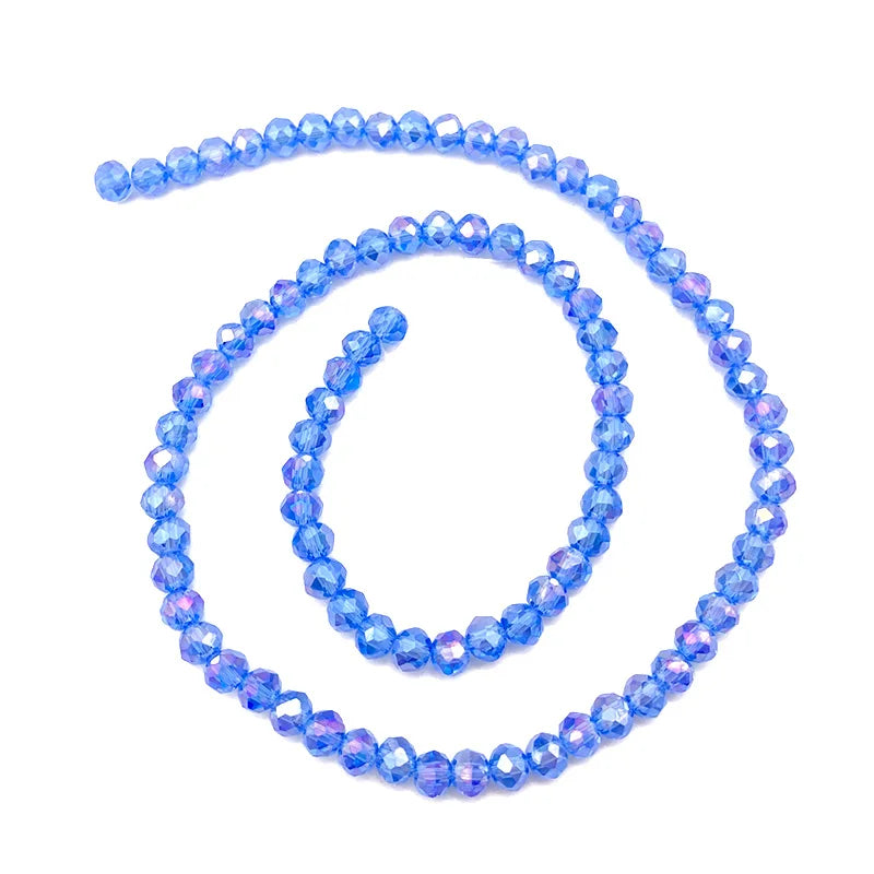 A spiral arrangement of light blue faceted crystal beads for jewelry making