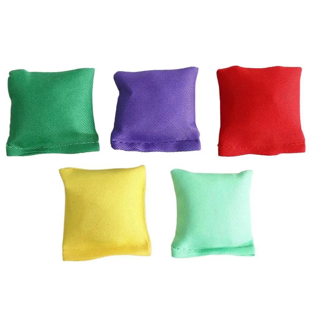 A set of ten colorful mini bean bags in shades of green, purple, red, and yellow.