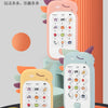 A set of three colorful baby phones or mobile phones with buttons and musical icons displayed on a dark surface.