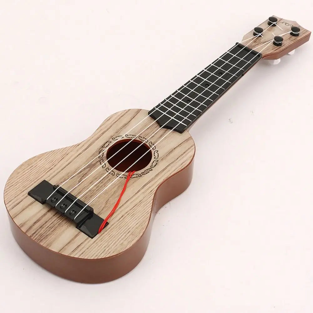 A wooden ukulele toy with adjustable tuning pegs and a soundboard, featuring a reddish-brown finish.