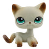 A charming bobble head pet figurine of a light gray cat with large green eyes and brown accents.