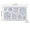 A white silicone mold set with six hexagonal cavities for making epoxy resin jewelry.